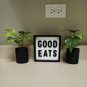 Hobby Lobby 'Good Eats' sign and 2 plants